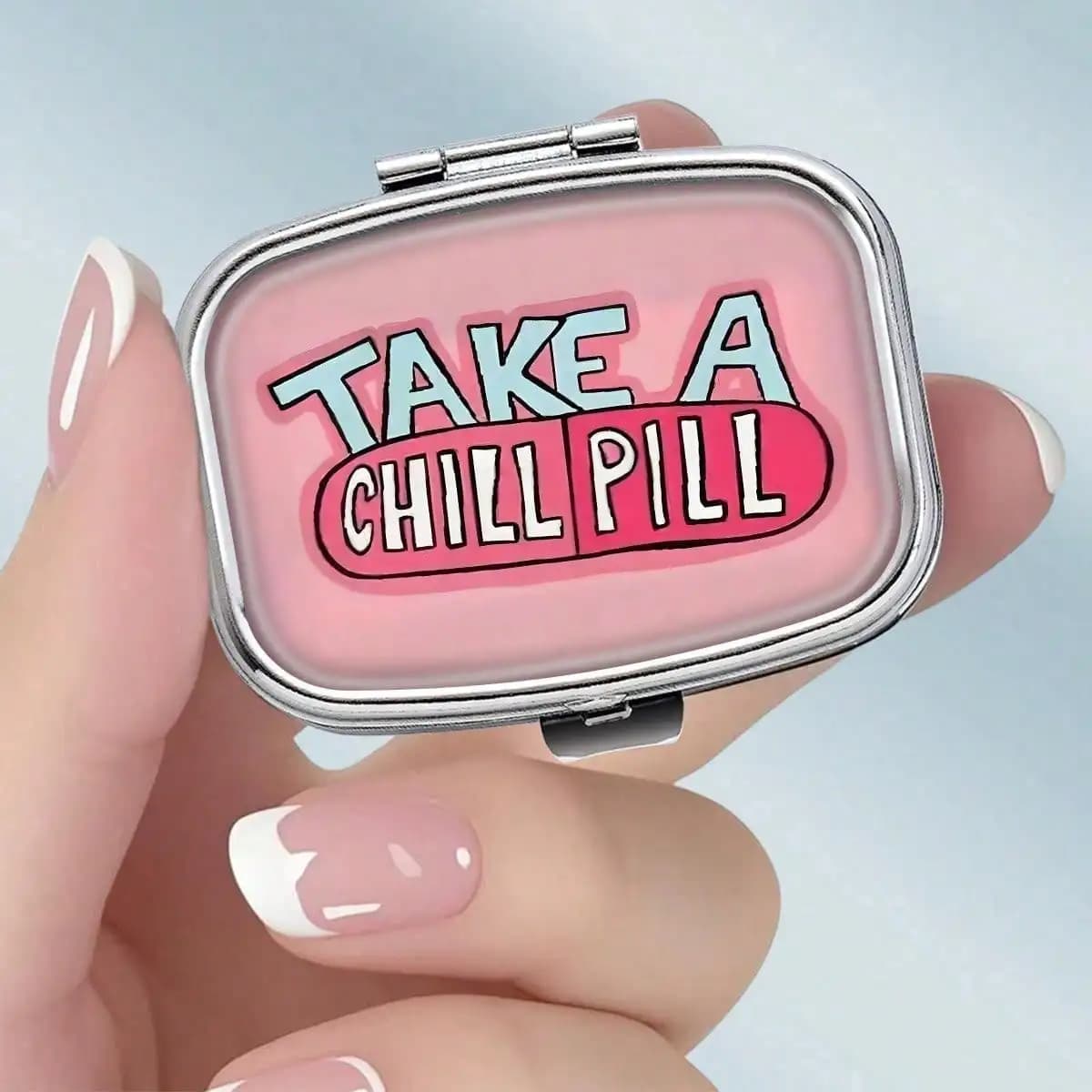This Portable Square Metal Pill Box Features a Fun and Entertaining "Relaxation Pills" Theme Design. Dual-Compartment Design Allows You to Elegantly Store Your Medications or Health Supplements. It Is Also Very Suitable for Organizing Vitamins and Storing Small Items.