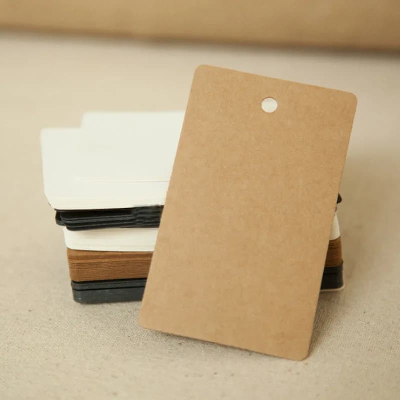 9 * 5,4 CM Stock Vuoto Kraft Regalo Cartoncino Prezzi Tag Note fai da te Etichette di carta marrone Supporto personalizzazione 100 pezzi / lotto