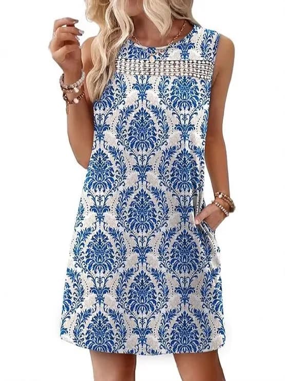 Sleeveless summer dress with print and lace, midi length, polyester, with round neckline and comfortable waist, for a casual look.