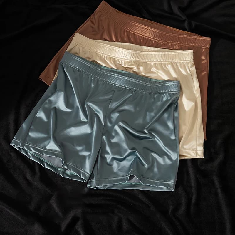 Pantaloni a freccia larghi in seta di ghiaccio Biancheria intima lucida di lusso in raso da uomo Indumenti da notte Boxer lisci e traspiranti Mutandine Mutande setose