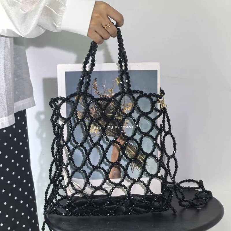 Nuove borse firmate versatili Borsa da donna in acrilico con tracolla cava intrecciata a mano Borsa da donna nera ad alto senso 2025