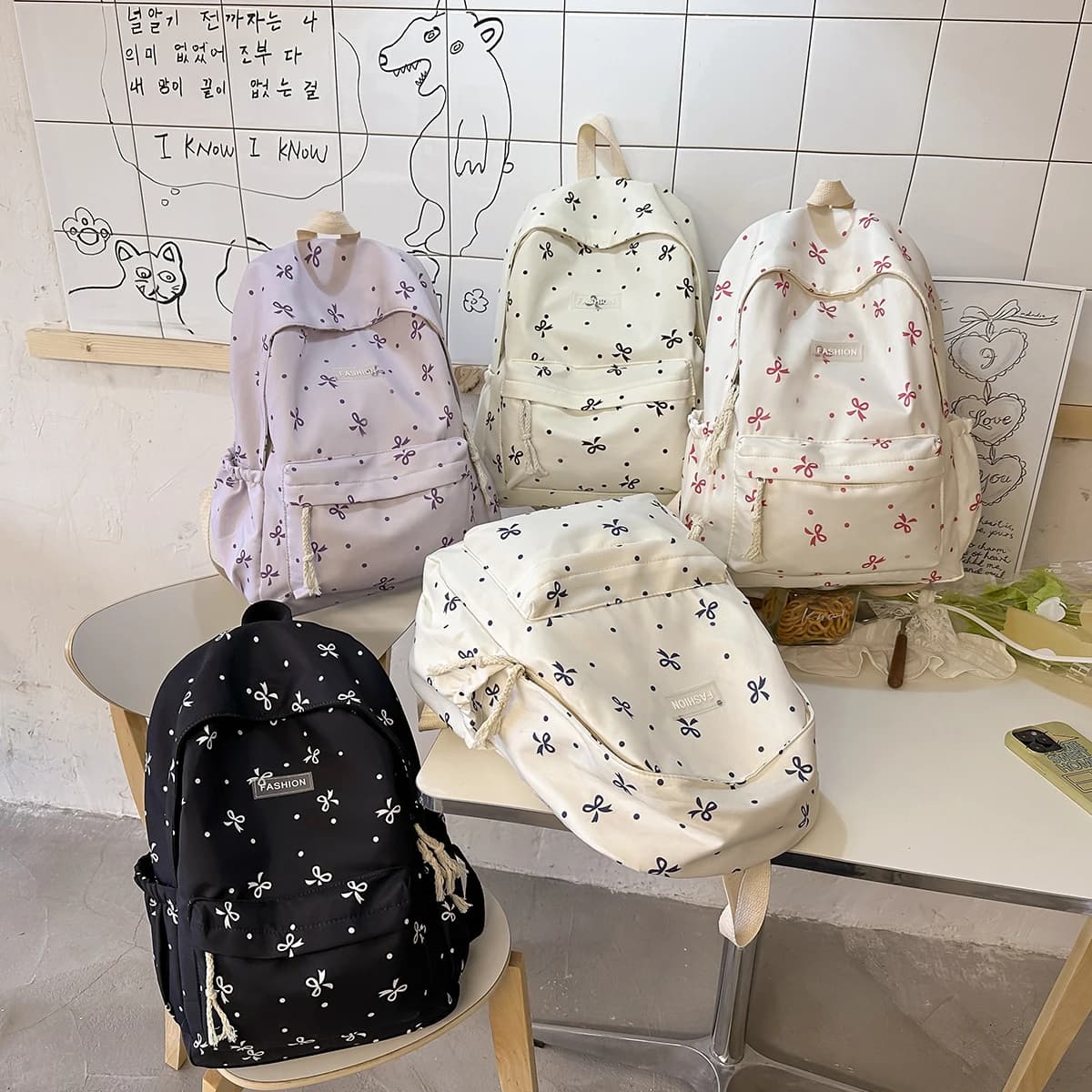 Zaino alla moda da donna: borsa da scuola in nylon con stampa fiocco e pois con cinghie regolabili e scomparti multipli per college e lavoro