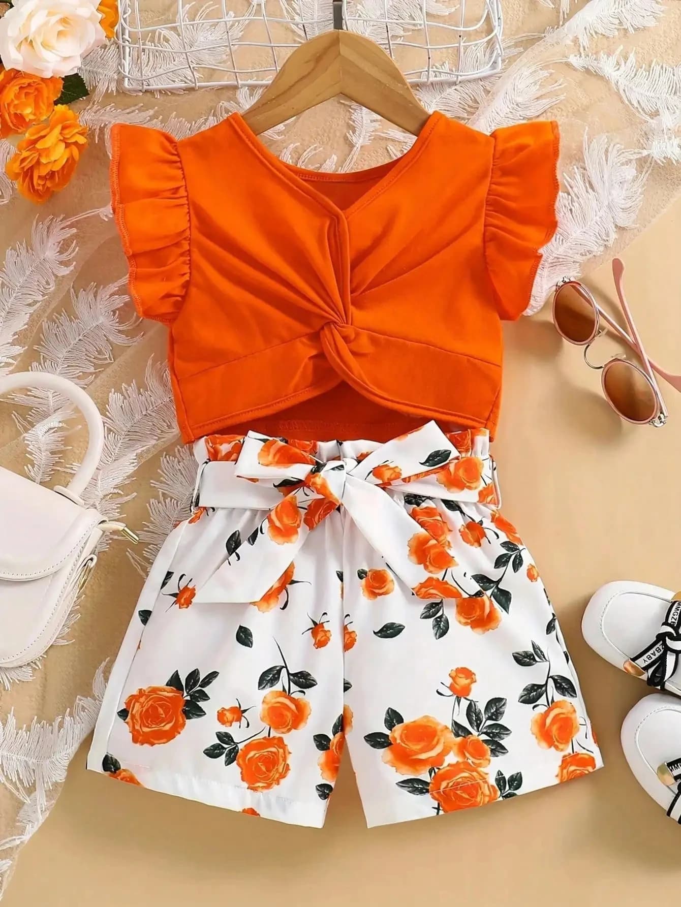 Leisure travel sleeveless ruffled sleeve bow design solid color printed floral pattern shorts children's clothing set