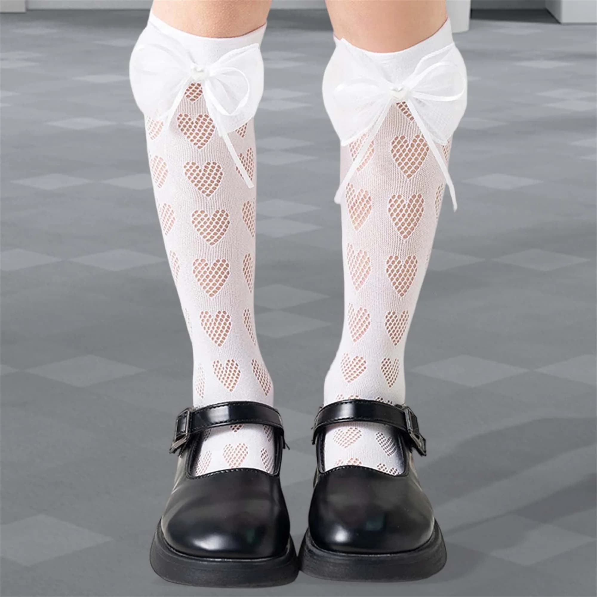 Calzini alti al ginocchio per bambine con decorazione a forma di papillon, calzini carini scavati a forma di cuore per l'estate