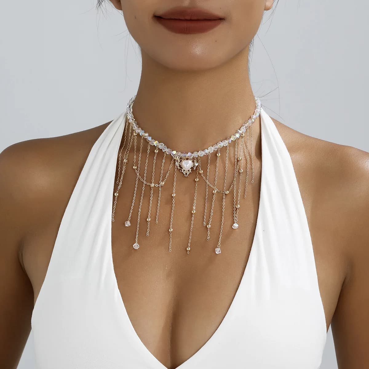 Collana con frange in stile INS dolce e cool, design irregolare con perle finte in cristallo, per il mercato europeo e americano