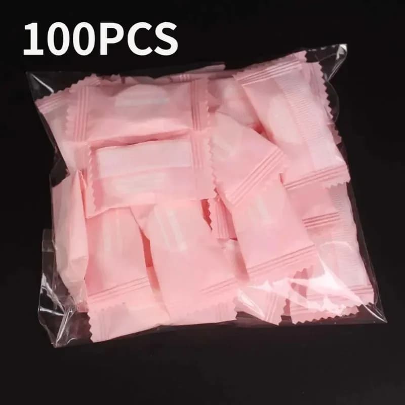 100 pz Mini Asciugamano Compresso Capsule Usa E Getta Asciugamano Magico Cura del Viso Tablet Salviette di Stoffa Da Viaggio All'aperto Maschera di Tessuto di Carta
