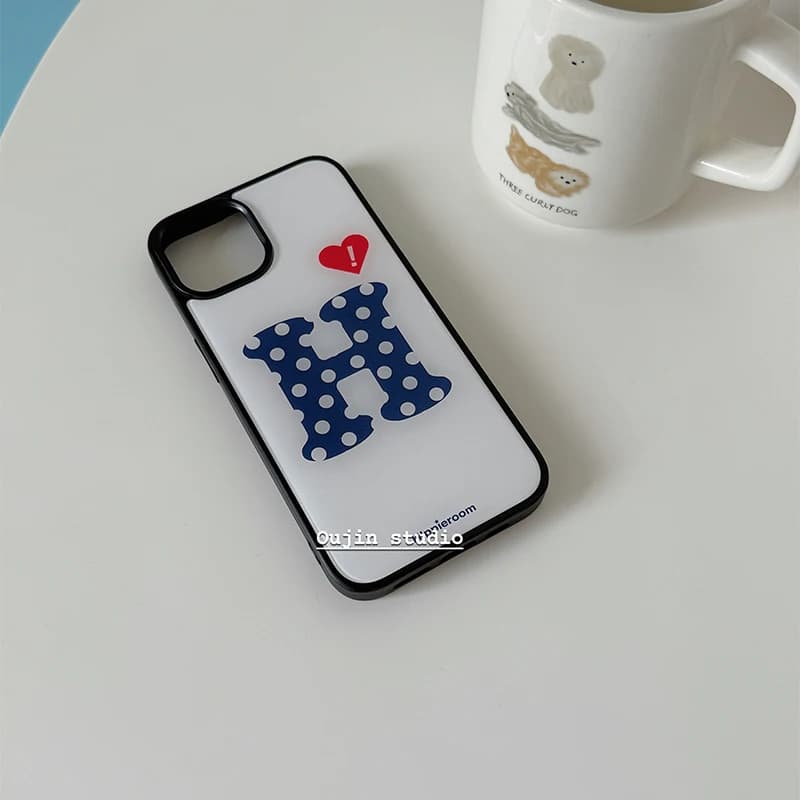 Cover posteriore per iPhone 17 Air 16 Pro Max 15 14 Plus 13 12 11 con lettera coreana a forma di 'H', pois e bordo nero, con colla a goccia
