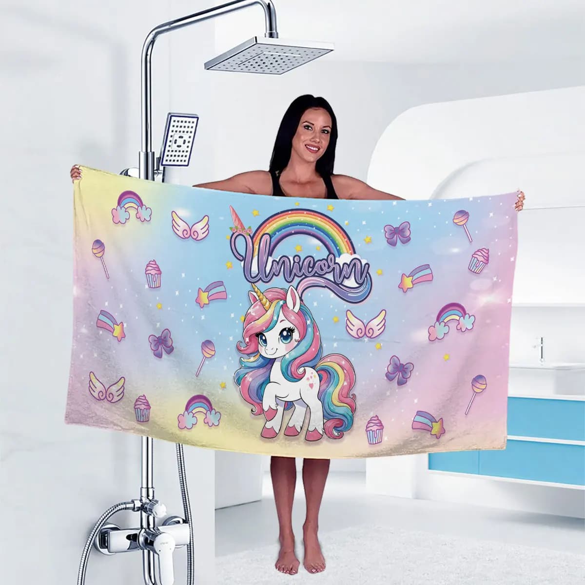 A soft, water-absorbent travel bathrobe featuring a rainbow unicorn and rainbow wings pattern, printed on microfiber fabric
