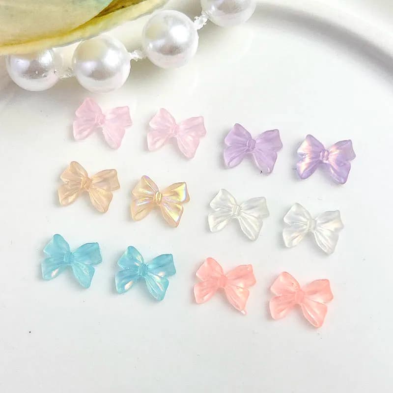50 pezzi misti casuali Auroa Bowknot pendenti per unghie fresche decorazioni per unghie in resina trasparente per manicure accessori gioielli fai da te