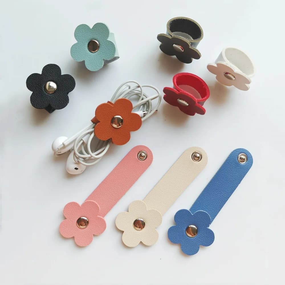 Avvolgicavo in pelle PU Fascetta per cavi a forma di fiore Supporto per cuffie Organizzatore di cavi Dispositivo di avvolgimento per cuffie