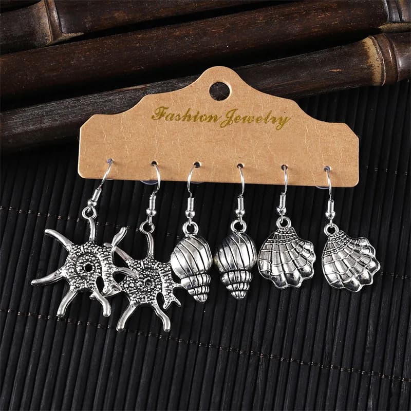 Set di orecchini in tre pezzi per la vita marina in stile vacanza al mare, orecchini con stelle marine e conchiglia dal design alla moda e creativo all'ingrosso