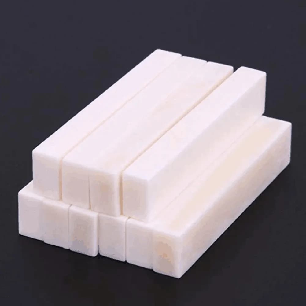 Chitarra in bianco osso dado ponte sella fai da te bufalo osso liutaio universale fai da te strumento a corda chitarra elettrica parti di ukulele