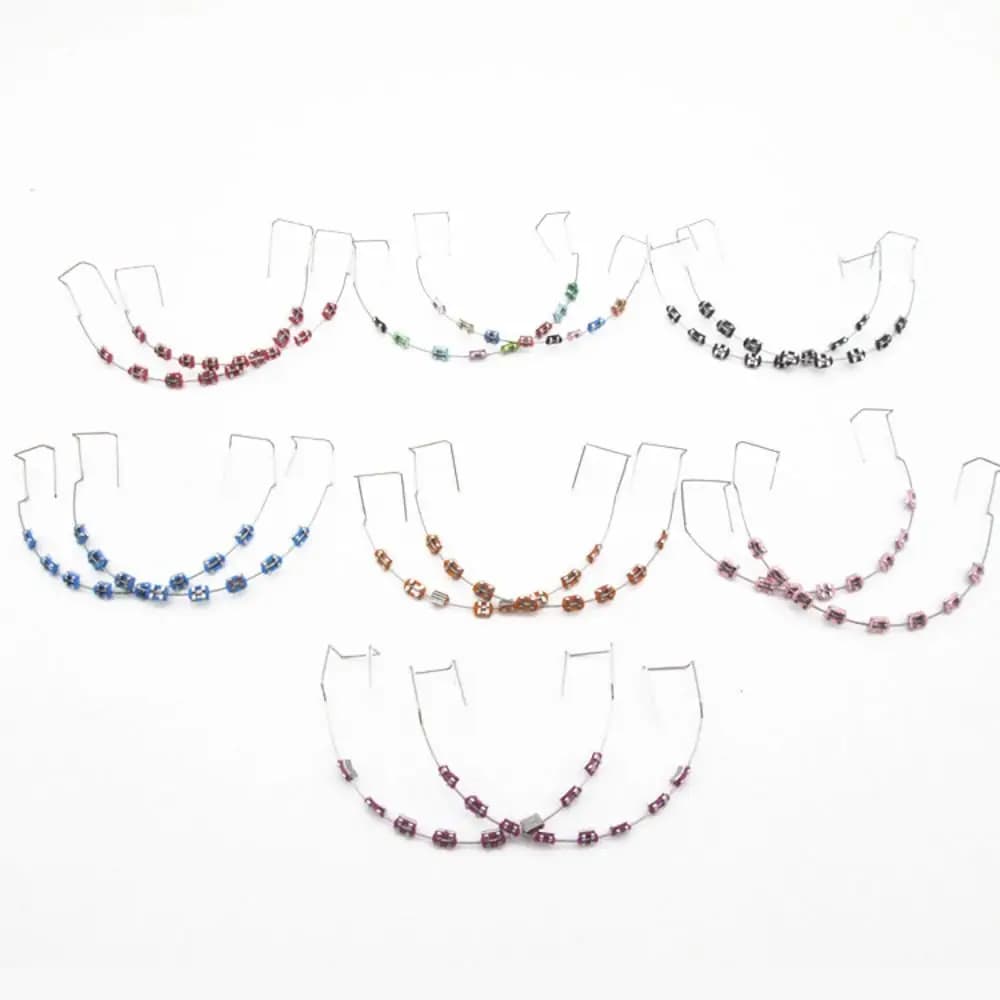 1 paio di decorazioni dentali temporanee colorate con fili metallici, decorazioni ortodontiche, legature per apparecchi, staffe finte.