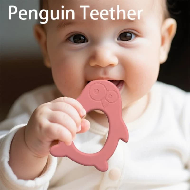 Massaggiagengive in silicone a forma di pinguino realizzato in materiale siliconico per alleviare la dentizione, ideale come regalo per le vacanze dei bambini