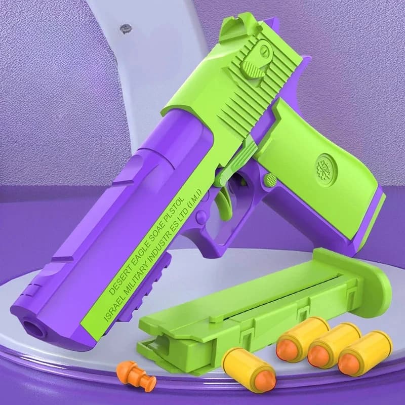 Vendita calda Carota Gun 1911 Afferrare a mano giocattoli Air-Hung Colt Modello Decompressione Lancio continuo Shell Giocattolo per bambini