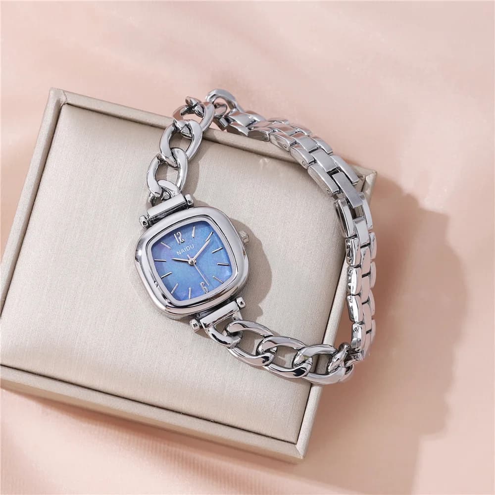 Fashionable woman watch with small dial and steel strap
