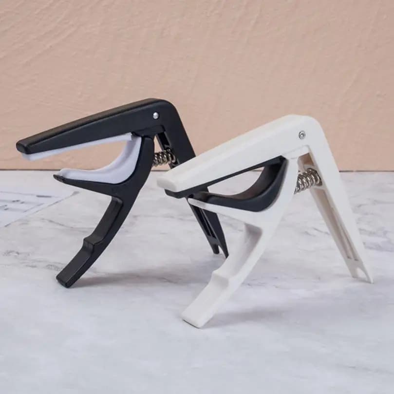 1 pz Capotasto per chitarra Capotasto per chitarra in plastica e acciaio per chitarra elettrica acustica Accordatura per ukulele con estrattore per perno