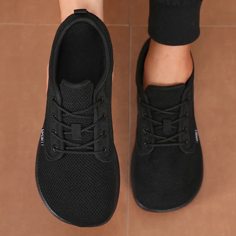 Scarpe da uomo Sneakers Punta larga A piedi nudi Casual Larga Ultima tela alla moda Scarpe piatte nere Scarpe da uomo in mesh traspirante