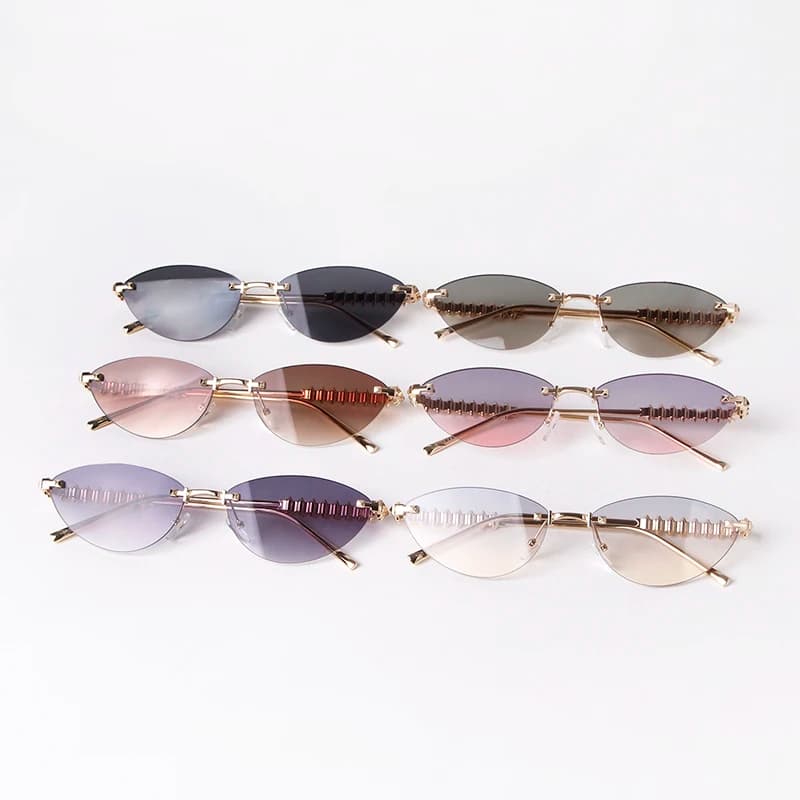 Trend Cat Eye Occhiali da sole senza montatura Donna Uomo Brand Design Luxury Metal Cool Leg Occhiali da sole Viaggi Frameless Shades Eyewear Donna