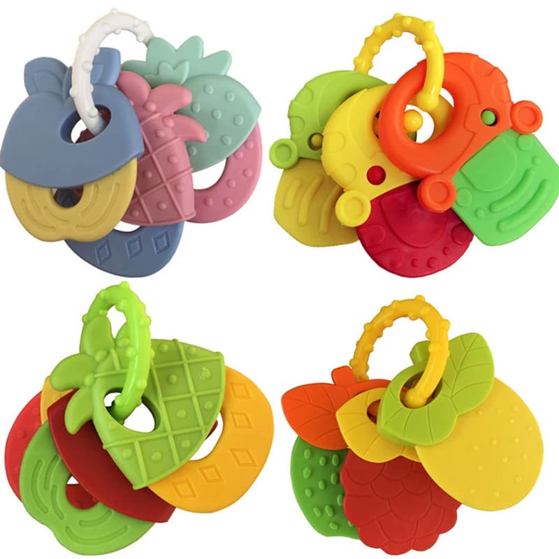 Colla per denti in silicone per bambini a forma di frutta Dispositivo di fissaggio per denti molari Colla per denti a sonaglio per lo sviluppo dentale infantile