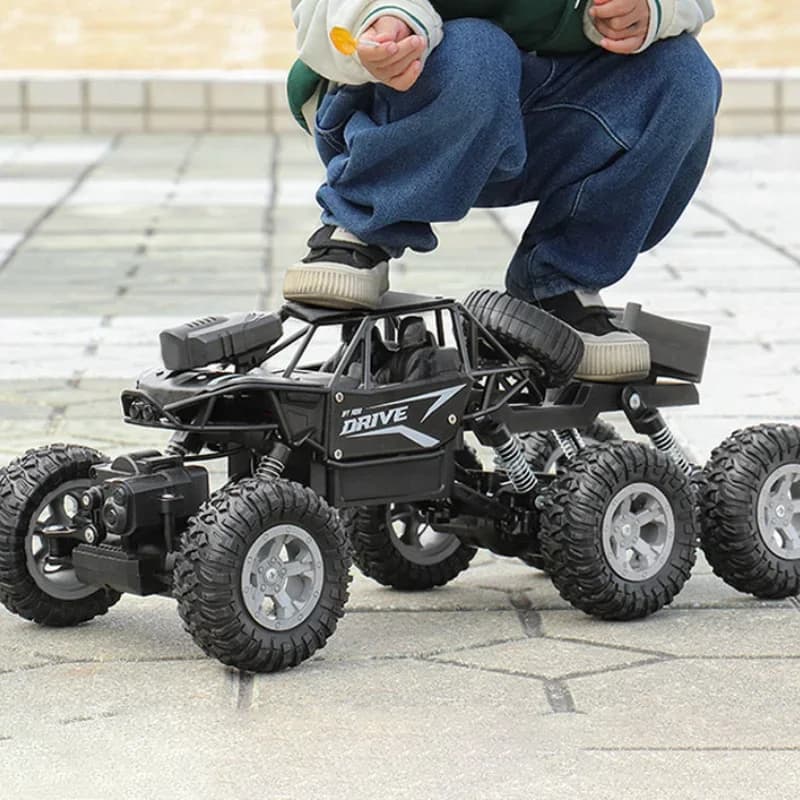 1: 18 Sei ruote motrici RC AUTO Cross-country Arrampicata Spray Auto da corsa Auto elettrica telecomandata Resistente alla caduta Giocattolo per ragazzo Regalo