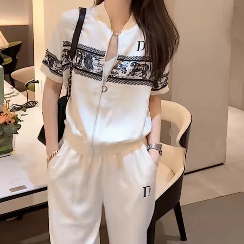 Set da 2 pezzi casual da donna francese in seta di ghiaccio fresca, comoda giacca estiva a maniche corte con cerniera e pantaloni sportivi sportivi larghi
