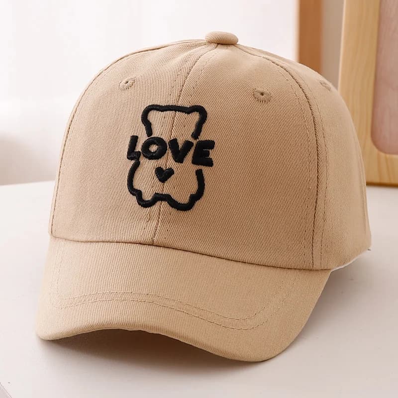 Simple and cute hollow-profile teddy bear heart-shaped LOVE embroidered baseball cap for kids, suitable for daily outings.