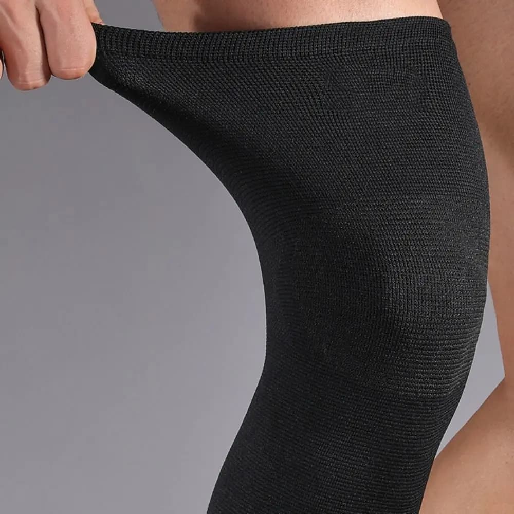 Supporto per ginocchio a compressione traspirante Materiale in nylon Ginocchiera dal design lungo Utile Ampia applicazione Protezione sportiva Pallavolo