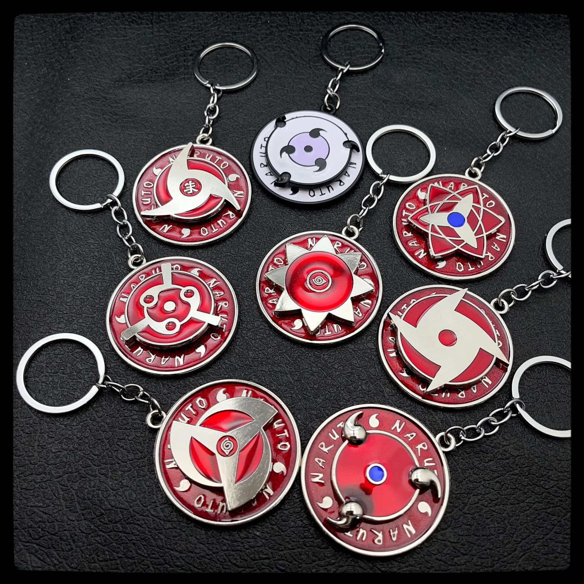 Naruto anime simpatico portachiavi periferico tre magma marleidoscopio Sharingan logo portachiavi girevole ciondolo portachiavi cartone animato