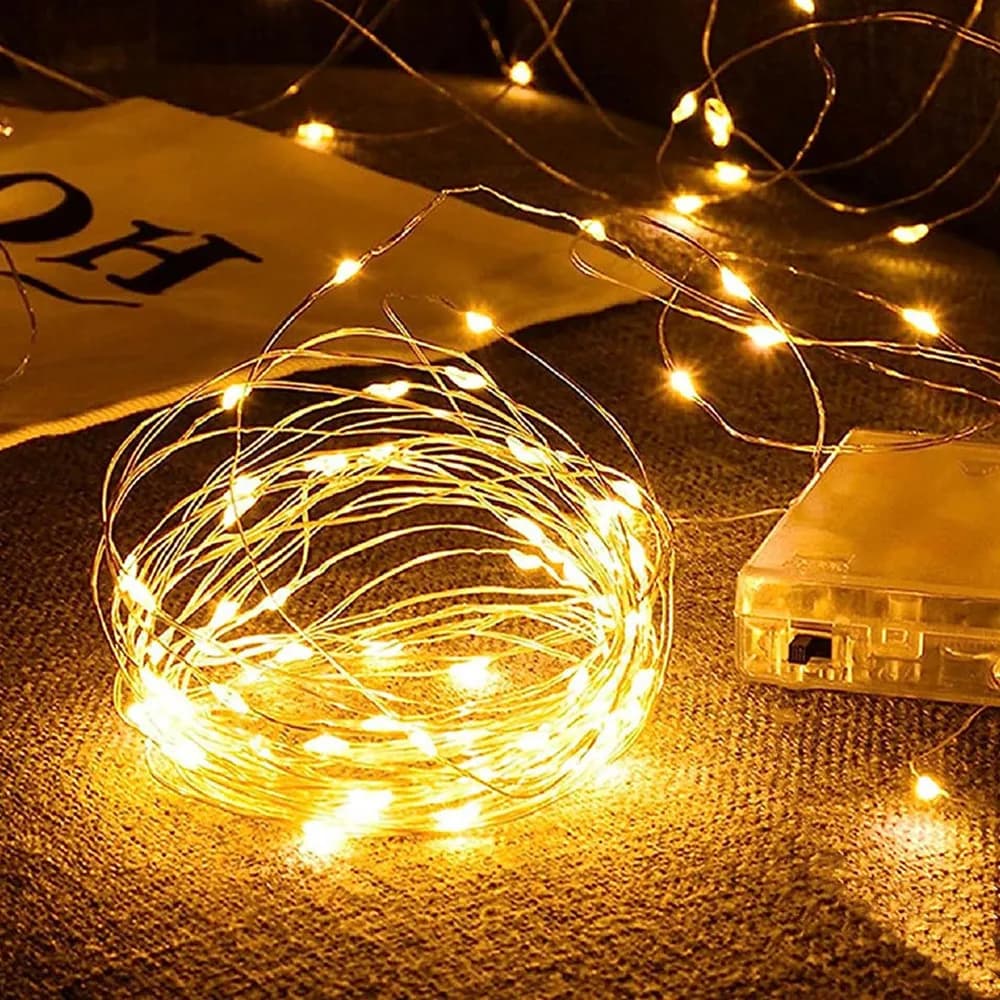 Luci LED a batteria da 1/2/5/10M con filo argentato per decorazioni di camera da letto, giardino, matrimoni, compleanni e Natale