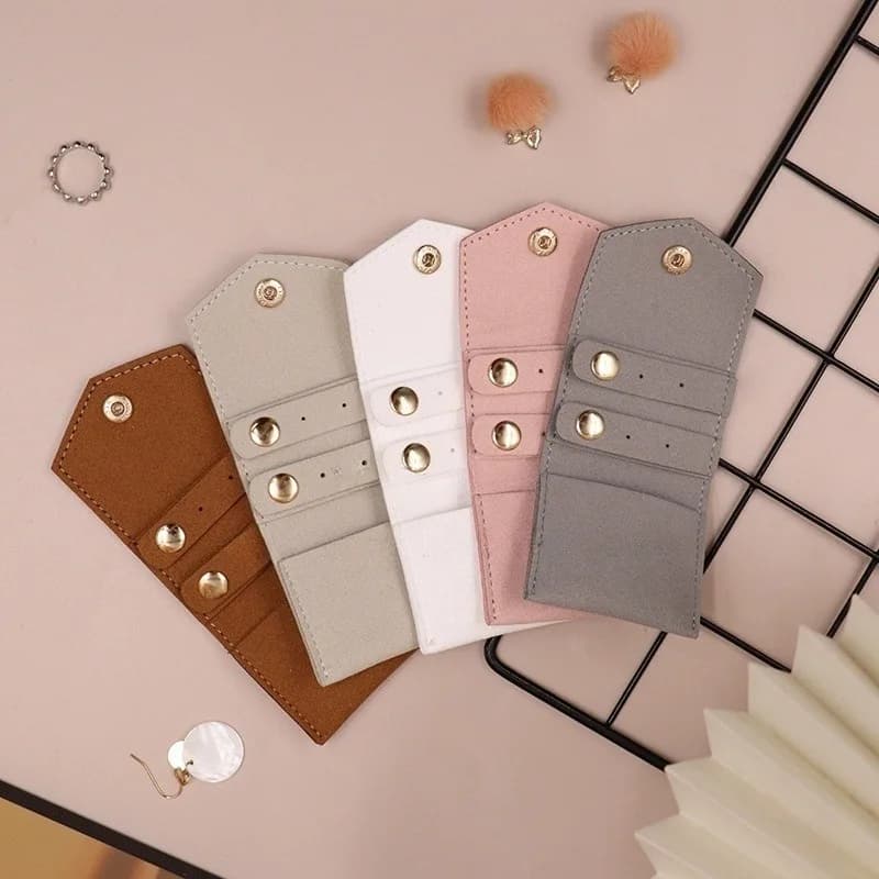 Organizzatore di gioielli portatile da viaggio pieghevole PU gioielli Roll Up Bag bracciale anello collana orecchini Display Collection Pouch