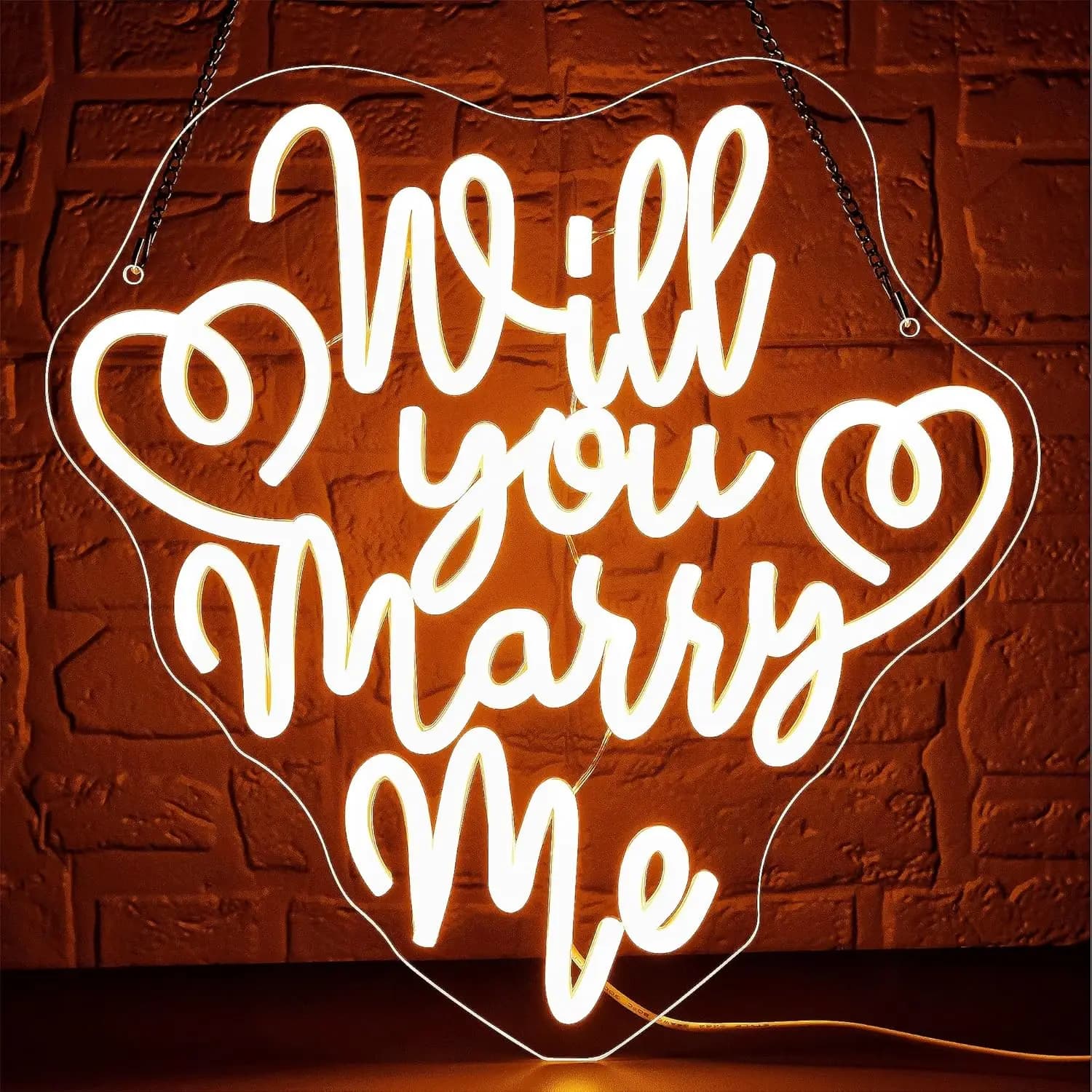 Insegna luminosa al neon 'Will You Marry Me' con luce morbida e diffusa, rilassante e tranquilla, perfetta per l'atmosfera di meditazione.