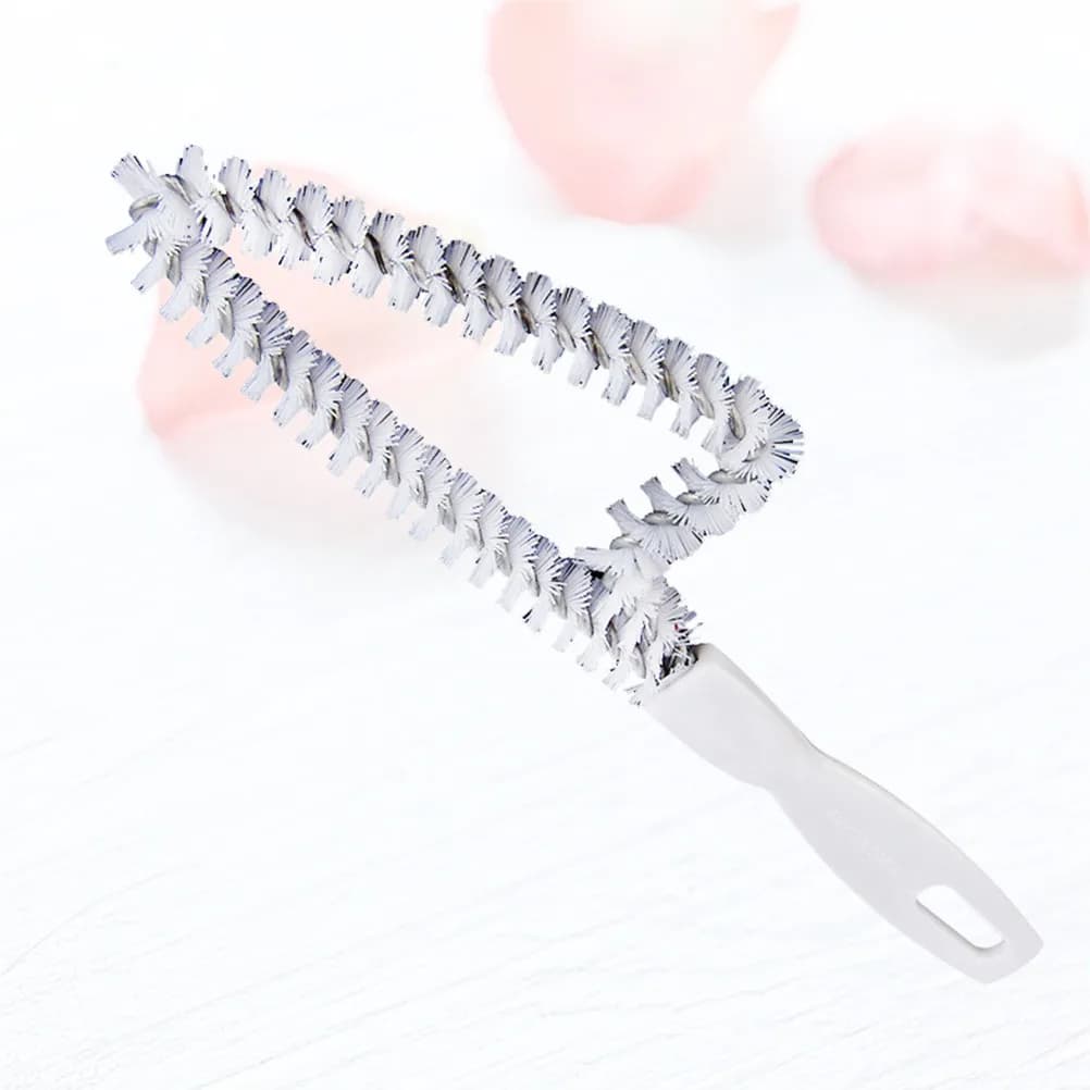 Plastic brush for cleaning air conditioner with long handle, brush for cleaning windows cracks, home tool for cleaning cracks.