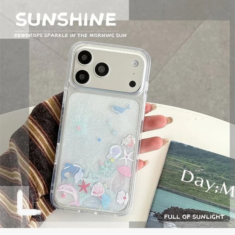 Custodia Liquida Glitter Quicksand per iPhone 17 16 15 Pro Max, Cover Trasparente con Sabbia Dinamica e Animali Marini (Delfini, Balene, Conchiglie)