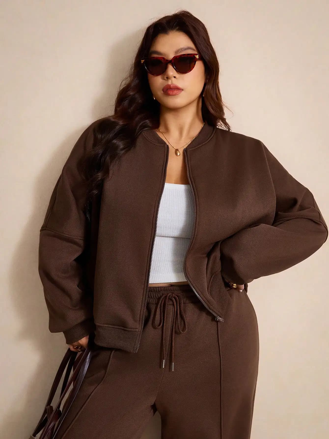 Set giacca bomber termica foderata e pantaloni a gamba larga taglie forti per la primavera