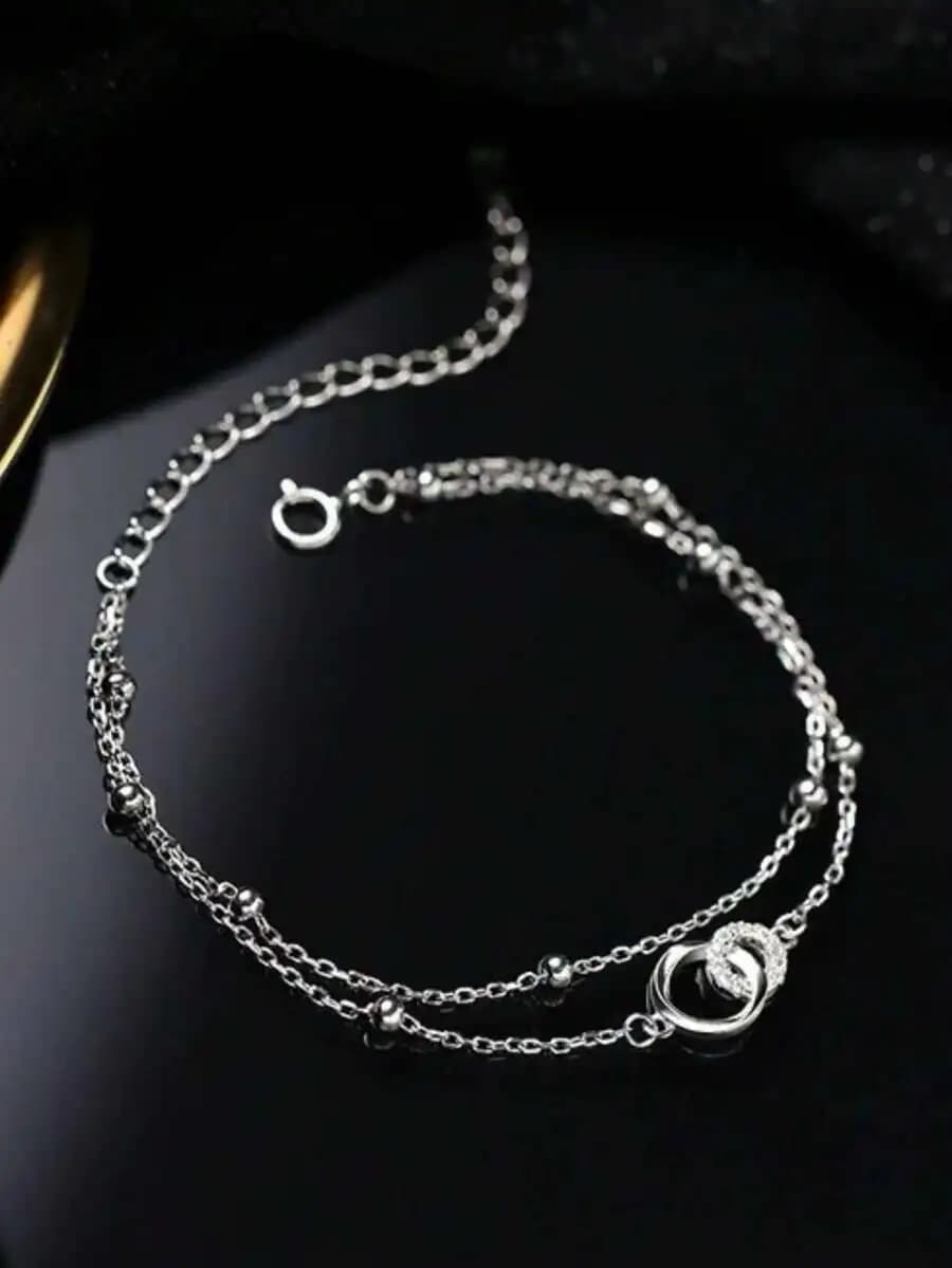 Elegante Bracciale a Doppia Catena con Design Mobius e Dettagli in Cristallo Scintillante per Donne, Accessorio Regalo di Lusso