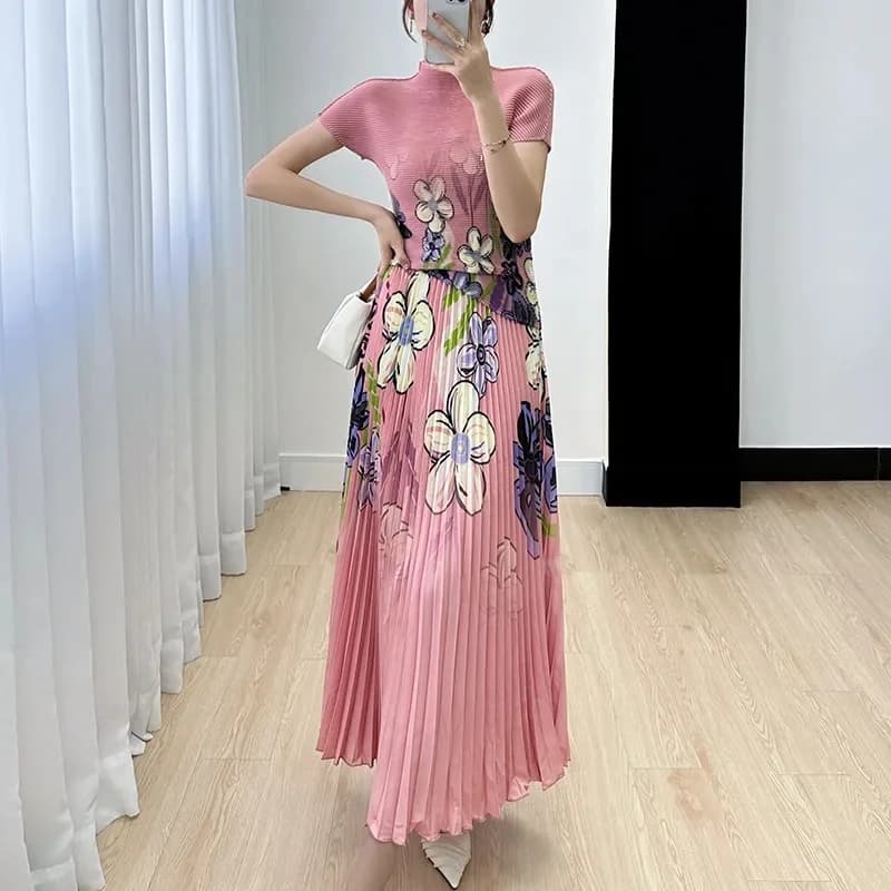 2025 Abito estivo da donna Nuovo stile occidentale stampato Top Set Moda da donna Look Temperamento sottile Mezza gonna piegata Set a due pezzi