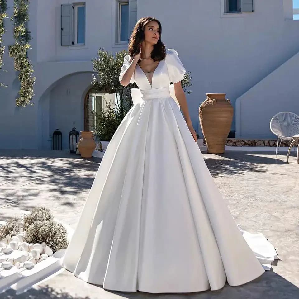 Abiti da sposa in raso bianco personalizzati con tasche maniche corte abito da sposa senza schienale a sbuffo per le donne Robe De Mariee Personalizza