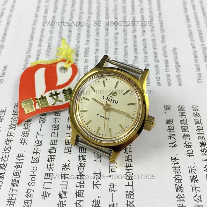 Wuhan Watch Factory, orologio meccanico manuale da donna con quadrante giallo e cinturino con guscio giallo marca Reddy, diametro 27 mm