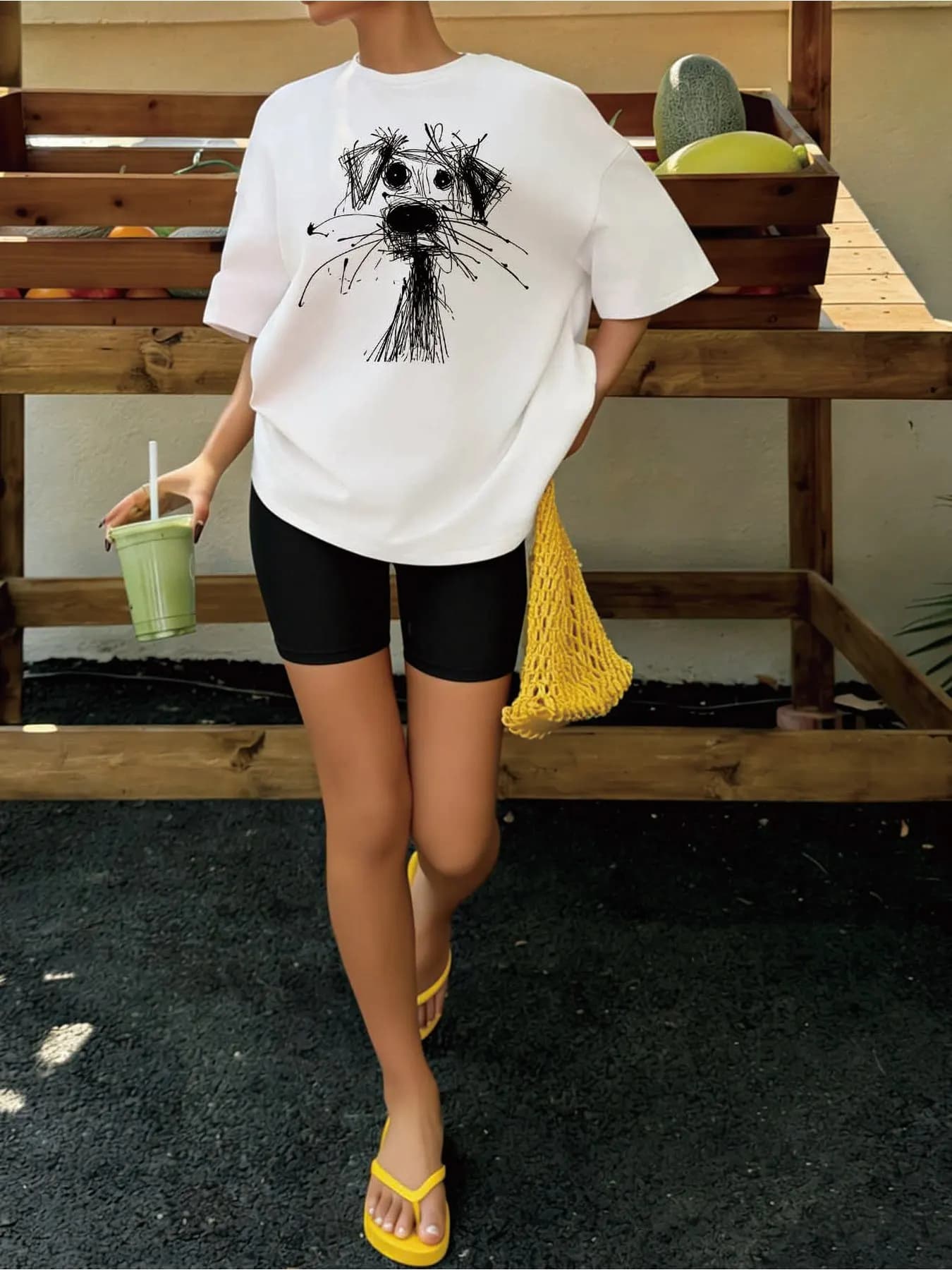 Two-piece set consisting of oversize t-shirt with hand-drawn graffiti dog print and cycling shorts