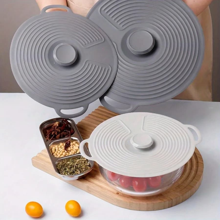 Three silicone covers, with double handles and suction cup closure - suitable for bowls, plates, pans and cups