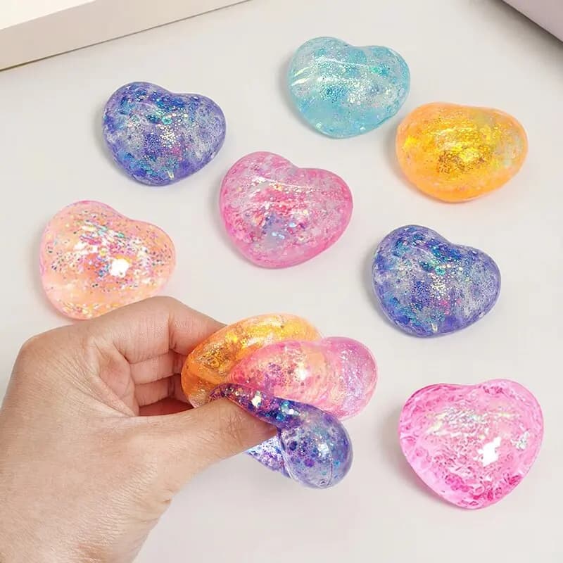 Giocattolo Antistress a Forma di Cuore con Paillettes Cangianti, Gadget per Alleviare lo Stress, Ideale come Regalo per Feste per Bambini