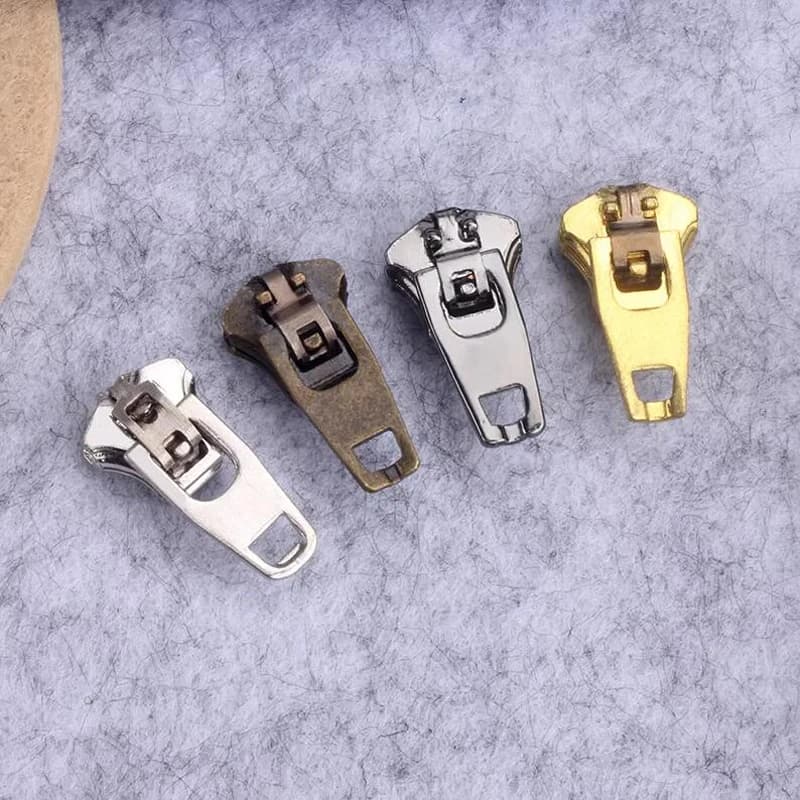 10 pezzi 3 # 4 # 5 # Cursori con cerniera per jeans in metallo all'ingrosso per teste con cerniera per pantaloni casual Accessori per cucire jeans fai da te su misura