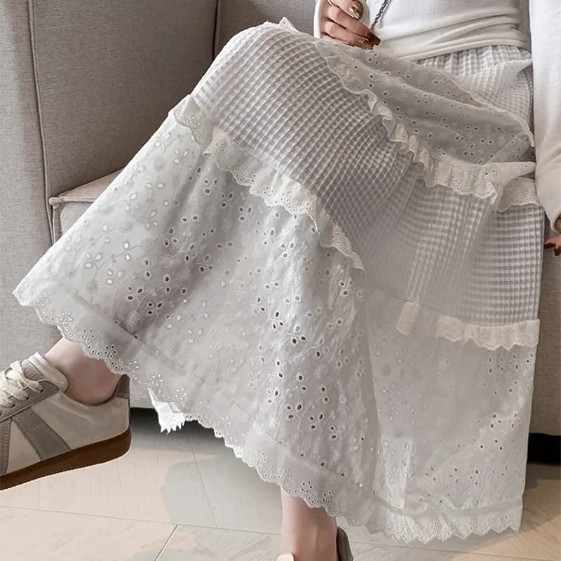2025 nuove gonne a pieghe in pizzo per le donne primavera autunno gonne a vita alta vuote bianche donna gonna a trapezio in vita elastica Mujer