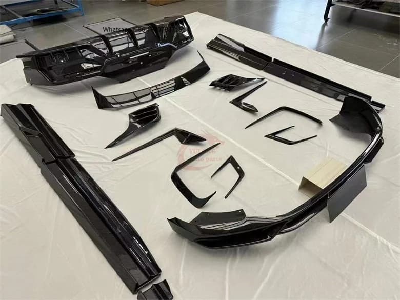 PK Style Carrozzeria Kit in Carbon Fiber Bucket: Front lip, Side miniskirts, Rear diffuser and Rear Spoiler for Lotus Eletre