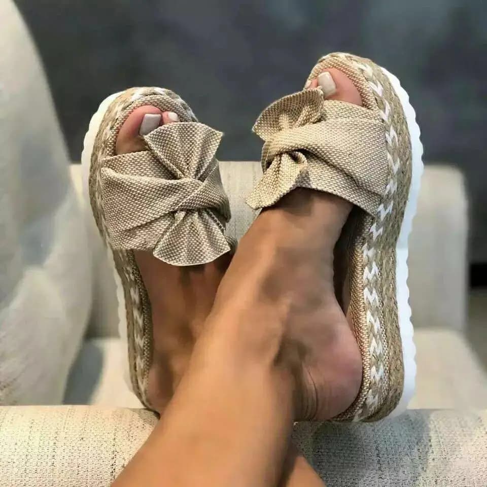 2026 summer new fashion women's one-word cool slippers women's outer wear summer wedge heel bow slippers women's beach sandals