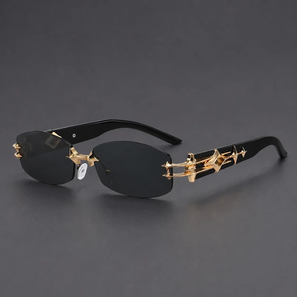 Internet celebrities with frameless sunglasses men and women 2026 trendy retro polygon advanced sense Y2K sunglasses stars