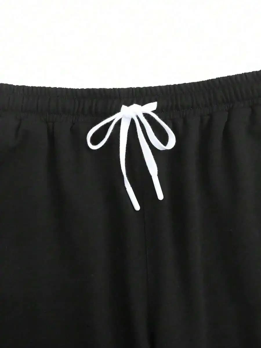 Pantaloncini da uomo neri con coulisse in vita e tasche, outfit casual estivo