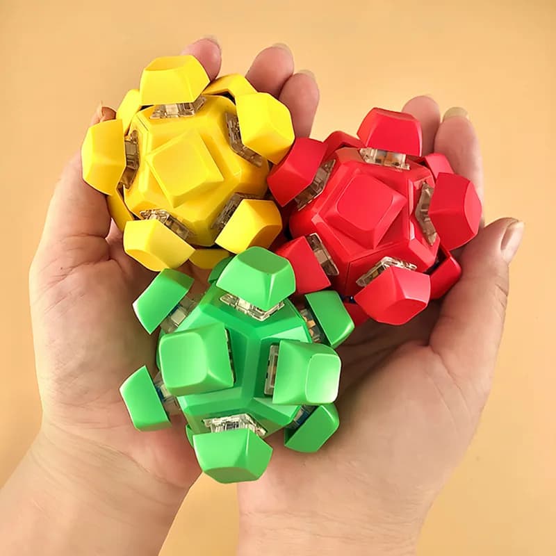 NUOVO 12 tasti Pulsante Tastiera Copritasti Portachiavi Dito Spinner Punta delle dita Giocattolo Agitarsi Pulsante Partito Sollievo dallo stress Vent Giocattolo antistress