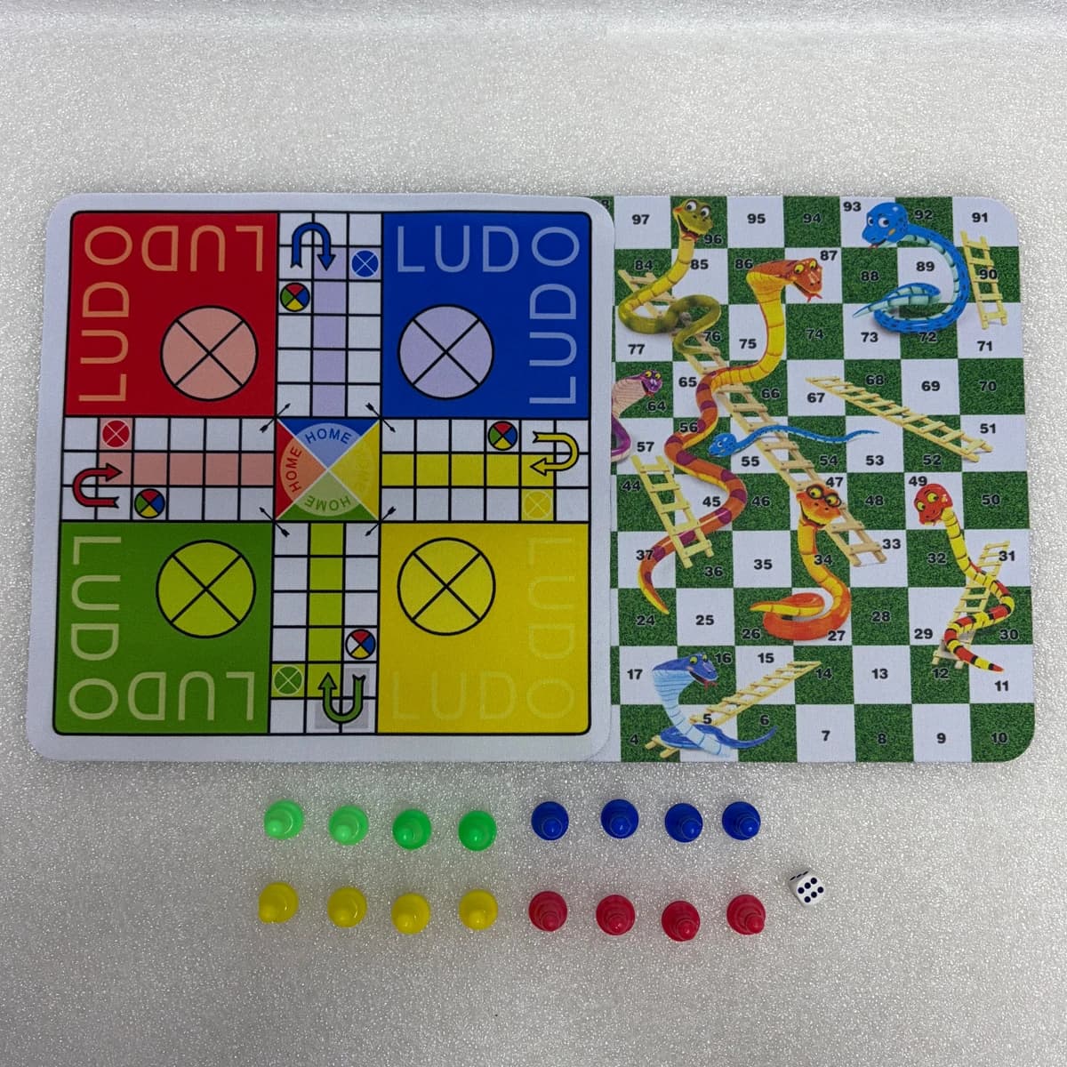 2-in-1 Set Includes Both Ludo and Snakes and Ladders Complete with 24cm Standalone Rubber Game Board 16Pcs Plastic Pieces 2 Dice